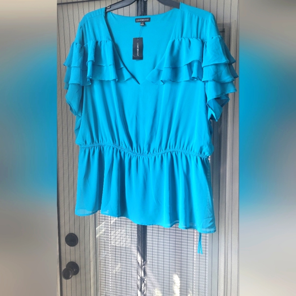 Lane Bryant turquoise sheer blouse size 22 with V-neck drop and ruffle details.